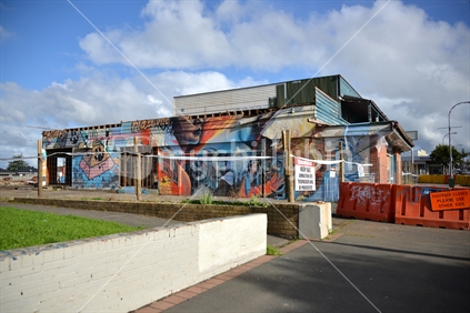 Stage 2 of demolition of the historic Kaikohe Hotel, Graffiti art slowly being taken down.
