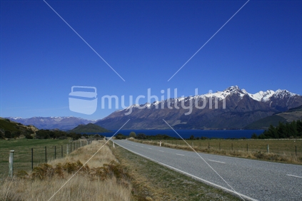 Driving the road from Glenorchy to Queenstown approaching Lake Whakatipu, New Zealand