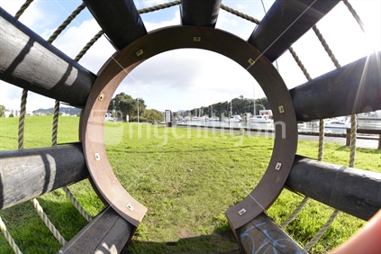 A large open weave steel play tunnel construction, in Central Park Whangarei.