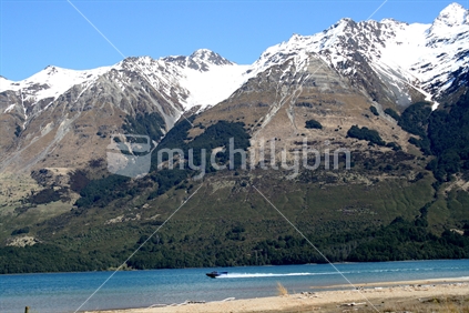 People enjoying a jet boat ride on the Dart River at Glenorchy, New Zealand