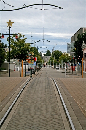 Tramlines and overhead wires leading into shopping centre, Christchurch, Canterbury, New Zealand