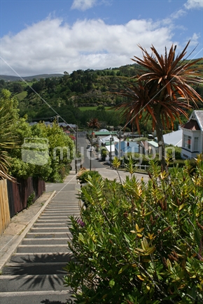 Concrete steps up and down Baldwin Street; the Steepest Street in the World.  Dunedin, South Island,