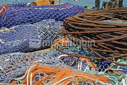 Tools of a fisherman's trade, large fishing nets and wire ropes.