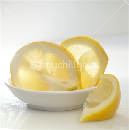 Image of lemon slices in white bowl