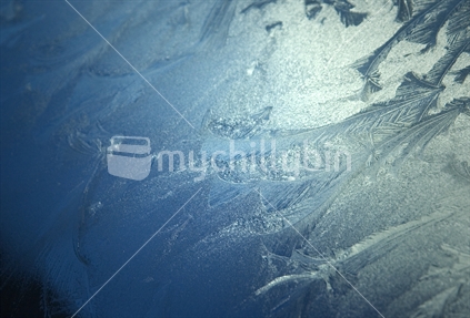 image of ice patterns on a blue background