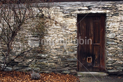 Schist Stone Building and Wooden Doorway, South Island