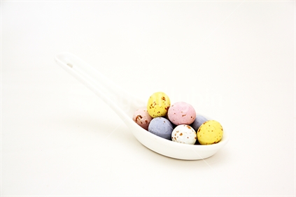 Small Coloured Easter Eggs served on a spoon