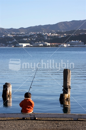 Boy with fishing rod, Wellington, New Zealand