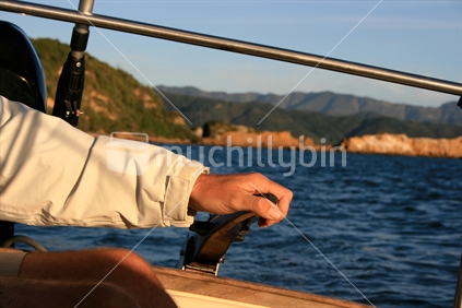 Skipper's hand on tiller