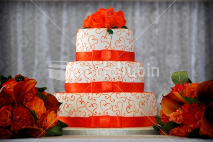 A modern orange wedding cake