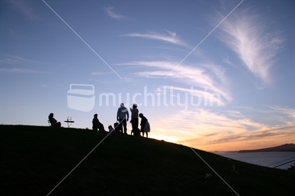Party on a late Summers evening, Church Bay, Waiheke Island, New Zealand