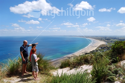 People at Ahipara Lookout; beginning of Ninety Mile Beach, Far North, New Zealand