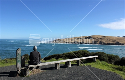 Man at lookout at the entrance to Hokianga Harbour 