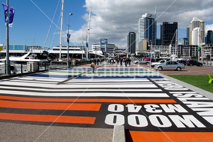This walkway at the Viaduct Harbour has the colours of teams competing in the Rugby World Cup on the pavement. 