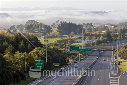 A view of State Highway 1 with fog in the Waikato Valley. Taken from Razor Back road - Pokeno. 
