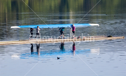 Lake Karapiro rowers putting their hull into the water.