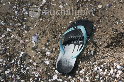 iconic summer footwear at the beach. 