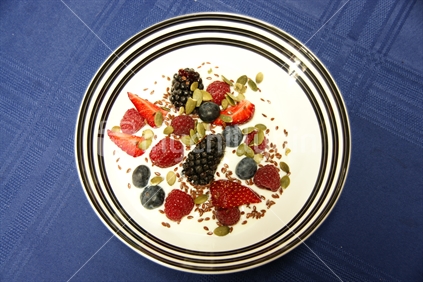 A bowl of berries with New Zealand yoghurt