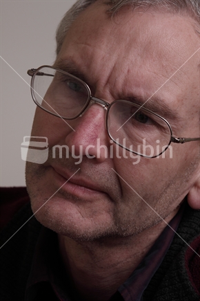 Man in 50's age bracket looking frustrated