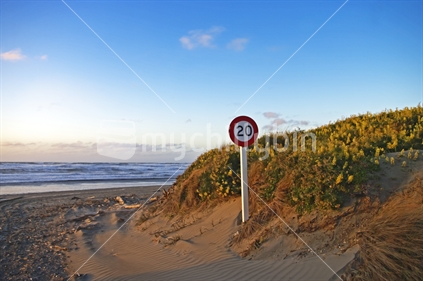 A road sign on the access to the beach at Otaki Beach, North Island, New Zealand