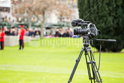 A camera set up to film a public event