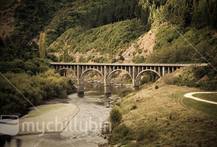 Bridge across the Manawatu River, as seen from the Manawatu Gorge (artistic treatment)