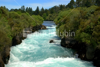 Water surges towards Huka Falls, Taupo, New Zealand