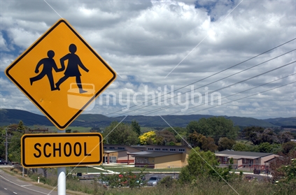 School sign on a country New Zealand road