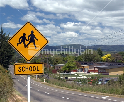 School sign on a New Zealand country road