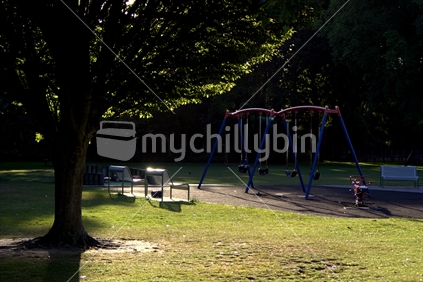 Empty park playground at twilight, Palmerston North, New Zealand