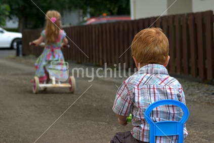 Two New Zealand children leaving for a ride