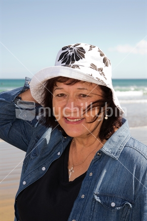 Maori woman at the beach in New Zealand.