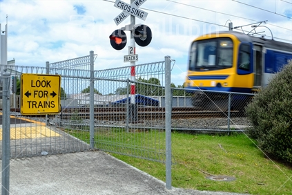Train approaching a level crossing