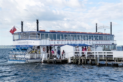 Tourists boarding cruise boat Lake Rotorua