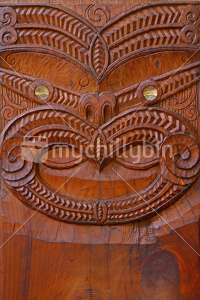 Bold maori carved head