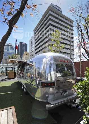Airstream trailer selling pies and coffee at Britomart. (lens flare)
