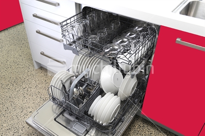 Open dishwasher full of clean dishes