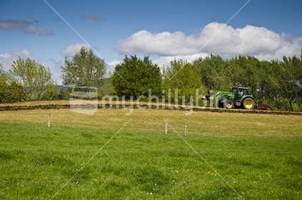 Tractor tilling farmland