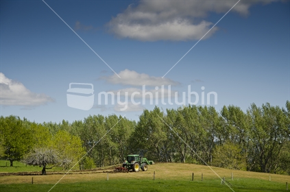 Tractor tilling farmland