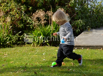 Boy Outdoors With Ball