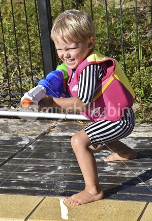 Boy with Water Pistol