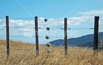 Wire fence and tensioners