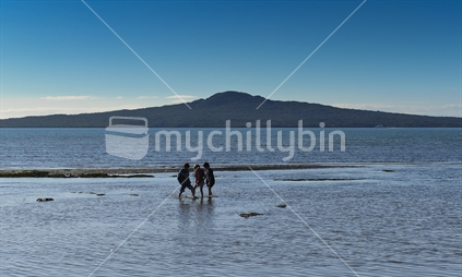 Three boys on Kohimarama beach, New Zealand