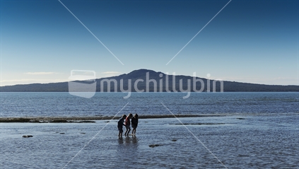 Three boys on Kohimarama beach, New Zealand