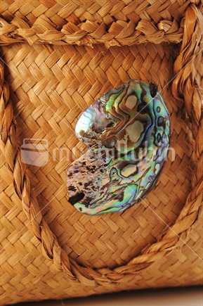Close up of Paua shell on Kete