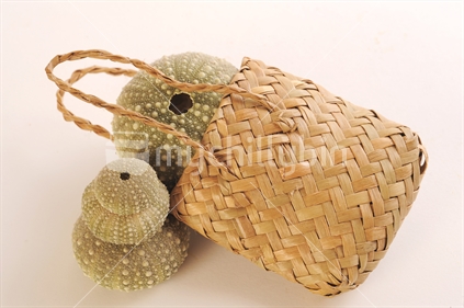 Kina and plaited flax basket
