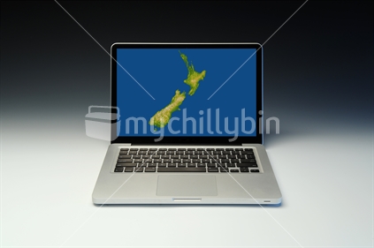 Laptop computer, with map of New Zealand on screen.