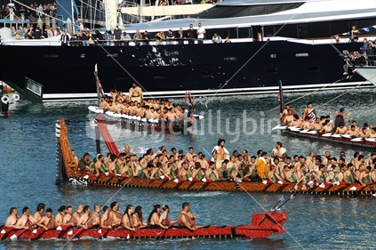Maori Waka arriving in Viaduct Harbour for the Auckland City RWC 2011 opening celebrations.  