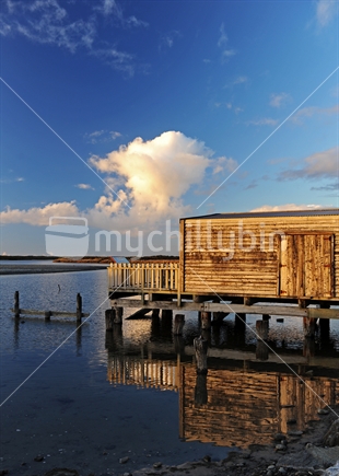 Old wooden boathouse on Okarito lagoon, South Island