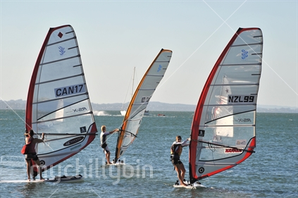 Three windsurfers on Waitemata harbour